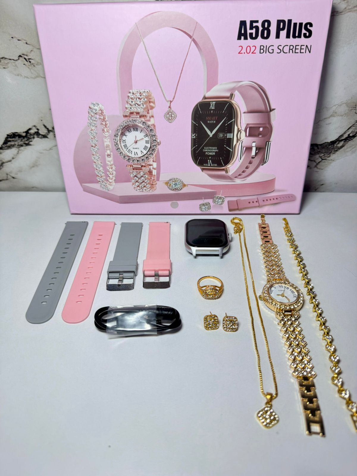 🎁 El Regalo Que Lo Tiene Todo + ⌚ ⌚ 1 Reloj Inteligente A58 Plus 🎀 2 correas intercambiables 💎 1 reloj tipo joyería 📿 1 collar ✨ 1 pulsera 💍 1 anillo 🌟 1 par de aretes ⚡ 1 cargador